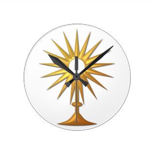Holy Eucharist in golden Monstrance Round Clocks