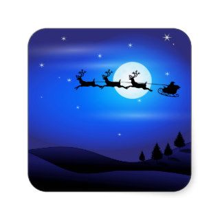 Santa and Reindeer Flying Across Blue Night Sky Square Stickers
