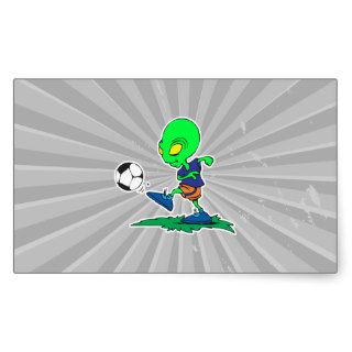 funny alien soccer player kicking ball sticker