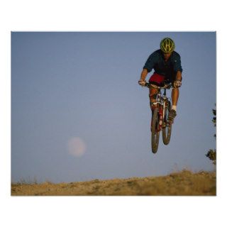 Biker makes a jump, Oregon Basin, Wyoming Posters