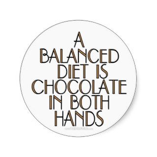 A balanced diet is chocolate in both hands round sticker