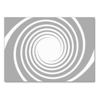 White spiral on light gray. business cards