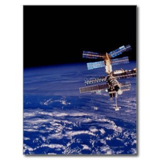 Mir Space Station floating above the Earth Post Cards