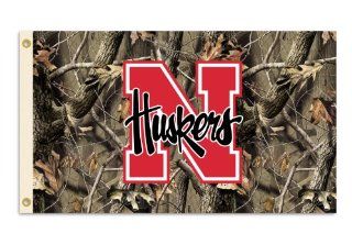 NCAA Nebraska Cornhuskers 3 by 5 Foot Flag with Grommets   Realtree Camo Background  Outdoor Banners  Sports & Outdoors