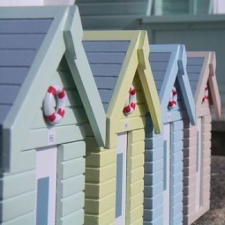 set of four beach hut boxes by buy the sea