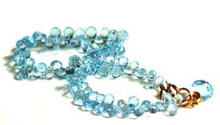 bridal sky blue topaz gemstone gold bracelet by prisha jewels