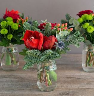 trio of christmas spruce flower jars by the flower studio