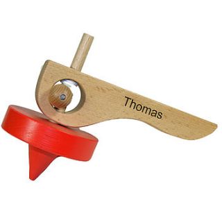 personalised traditional wooden spinning top by wooden keepsakes