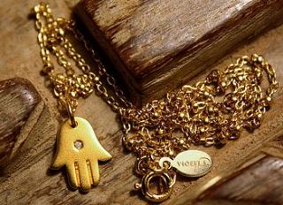 gold hamsa with diamond necklace by vioella