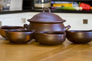 fair trade ceramic casserole set with four serving bowls  by alter native life
