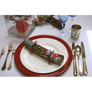 pack of six magazine christmas crackers by green ribbon