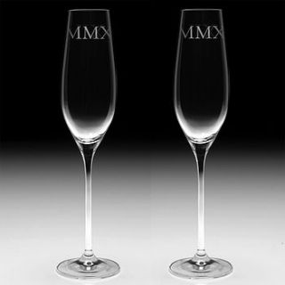 pair of champagne flutes engraved with mmxii by whisk hampers