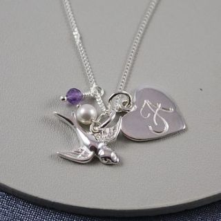 silver birthstone necklace with swallow by claudette worters