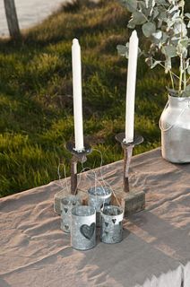 old iron nail rustic candle holder by the glam camping company