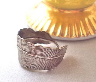 antiqued silver feather ring by a box for my treasure
