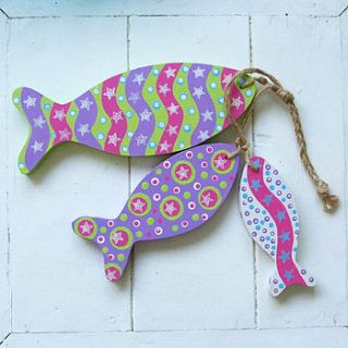 wooden fish decorations   bunches of three by half an acre