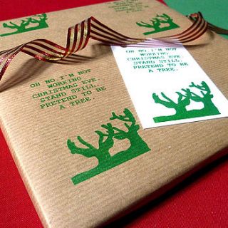 handmade joke christmas wrapping paper by indigoelephant