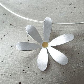 silver flower necklace with gold centre by cathy newell price jewellery