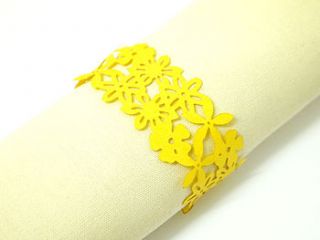 ten flowers laser cut napkin rings by intricate home