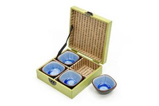 set of four ceramic bowls in a leather box by orchid furniture