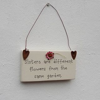 sisters are flowers sign by siop gardd