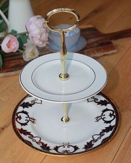 'majesty' blue and gold vintage cake stand by teacup candles