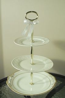 ornate white & gold cake stand by teacup candles