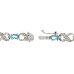 Glitzy Rocks Silver Swiss Blue Topaz and Diamond Accent Bracelet Glitzy Rocks Gemstone Bracelets