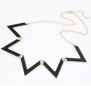 black and gold statement triangle necklace by lucky roo
