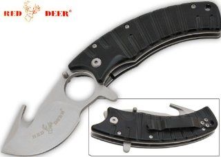 RDX 9800. 7.5 Inch Spring Action Black Red Deer Knife  Gut Hook & Skinner 7.5 Inch Spring Action Black Red Deer Knife  Gut Hook & Skinner. High Quality . Black handle and silver blade, this knife is excellent for gutting your red deer. With the spe