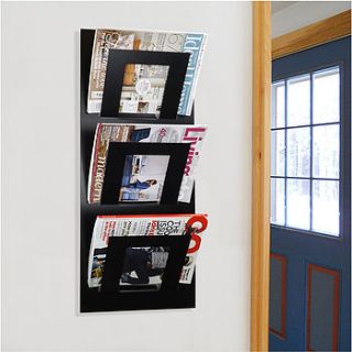 wall mounted three tier magazine rack by the metal house