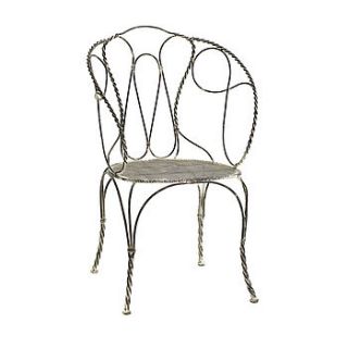 round backed metal chair by out there interiors