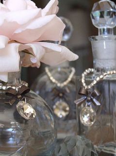 three cut glass and crystal perfume bottle by figa & co. ltd