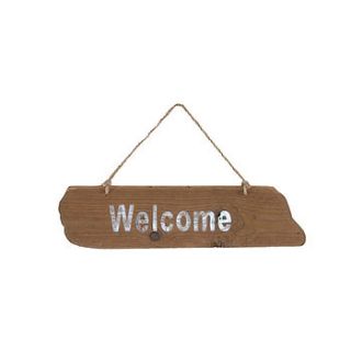 wood welcome sign by lindsay interiors