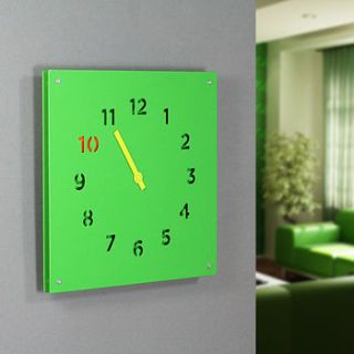steel wall clock, green by block