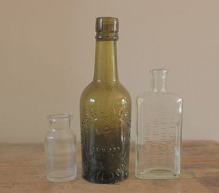 three glass vintage bottles by homestead store