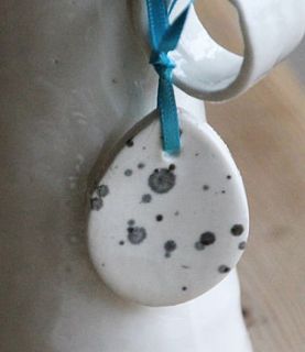 five handmade porcelain egg decorations by artisan