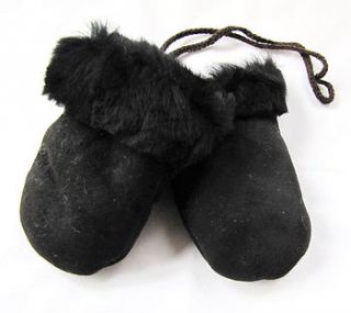 black sheepskin puddies on a string by baa baby