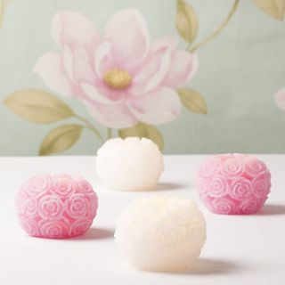 rose ball led wax candle by the contemporary home