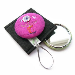 flower in a pot handbag mirror by sumptuosity