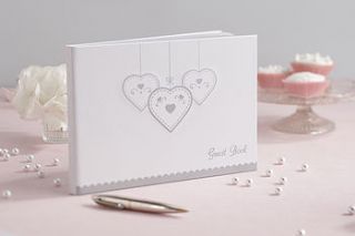 heart silver embossed wedding guest book by ginger ray