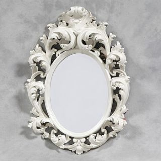 white oval rococo mirror by out there interiors