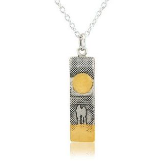 watching the sunset on the beach pendant by charlotte lowe jewellery