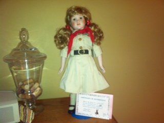 Beautifuly Crafted Marian Yu Design Heirloom Doll #1385 Out of 10,000 Made. Looks Like a Girl Scout, Comes with Certificate of Authenticity, Crafted From Bisque Porcelain, Hand Painted, Beautiful Hazel Eyes. 18.5 Inches in Height, with Stand, in Box, Brand