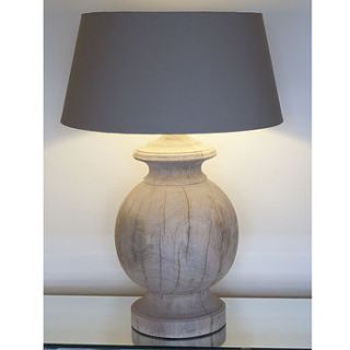 natural wooden table lamp by candle and blue