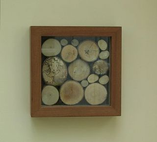 log wall hanging by strawberry interiors