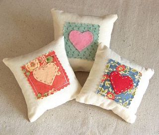 floral and love heart lavender pillows by laurafallulah