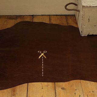 chocolate brown leather rug   process motif by susiemaroon