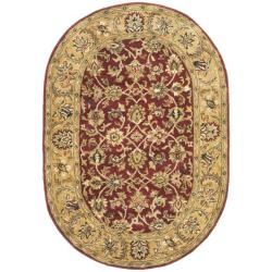 Handmade Classic Red/ Gold Wool Rug (46 X 66 Oval)