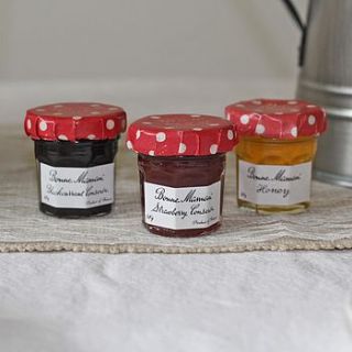 three mini jars of jam and honey by the wedding of my dreams